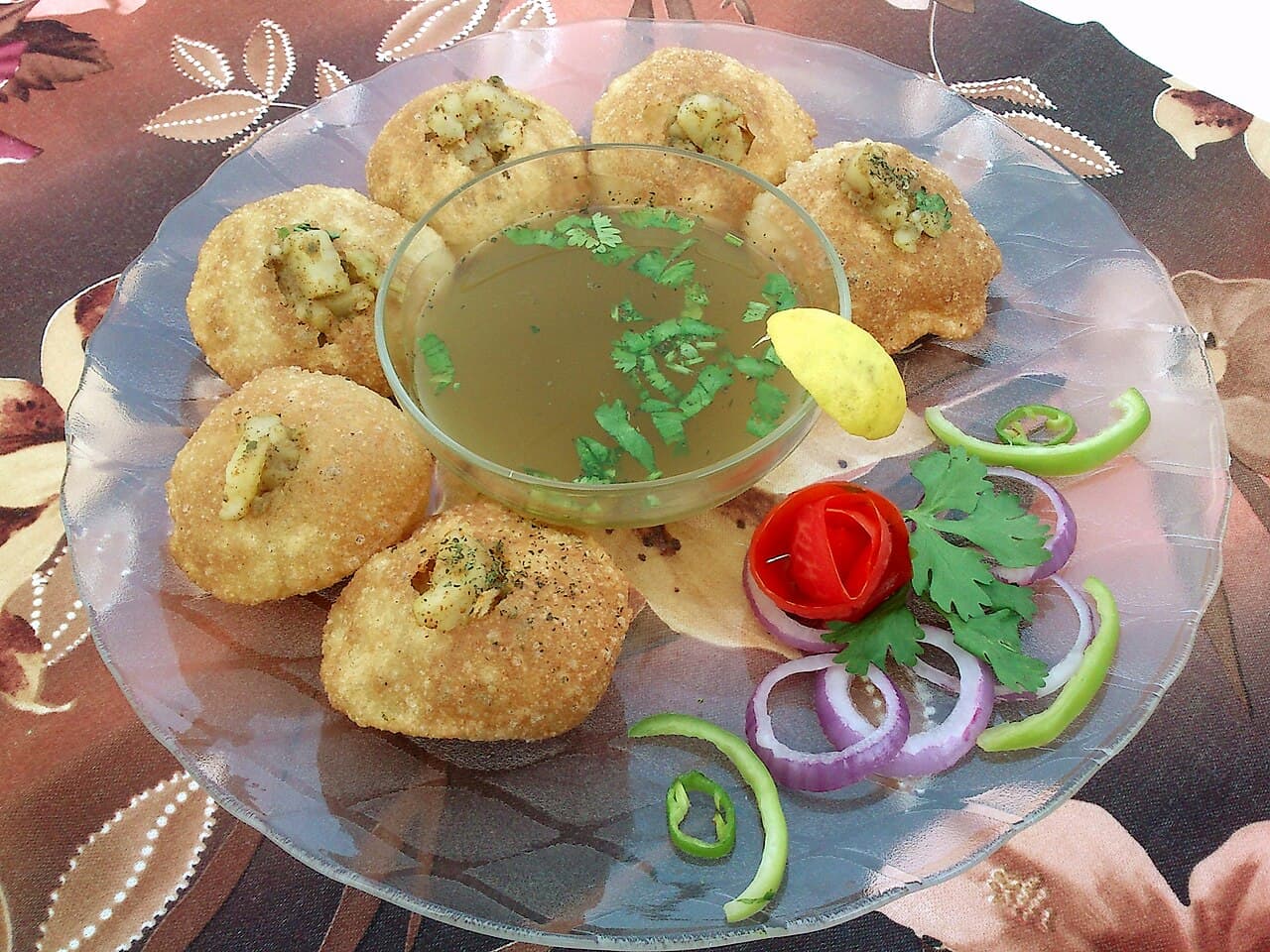 Pani puri platter with spiced water bowls